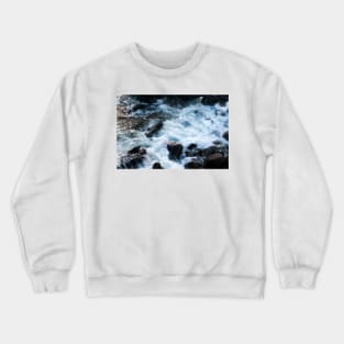 A breaking surge of sea water over rocks, Isle of Skye, Scotland Crewneck Sweatshirt